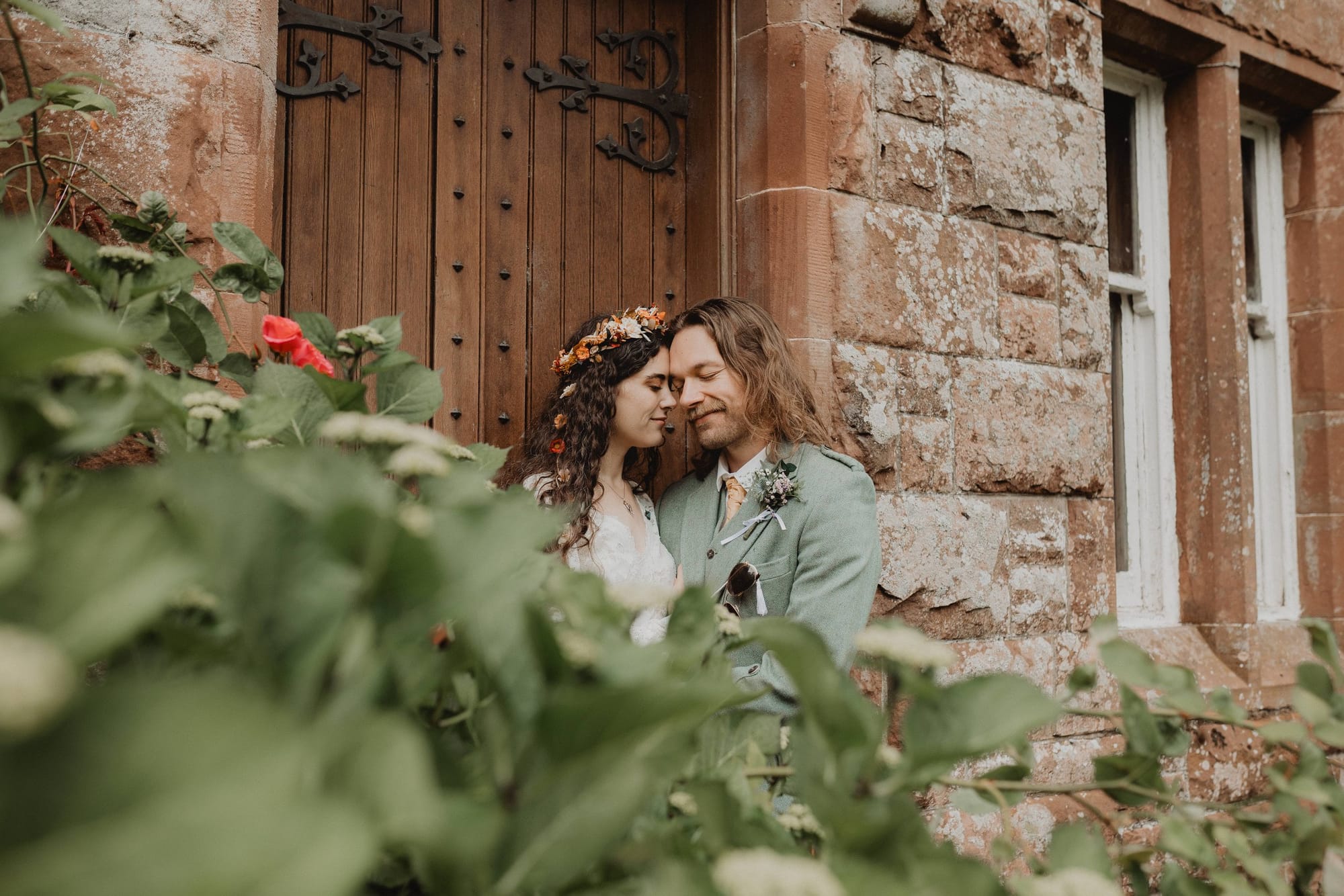 Rustic portrait by a castle door