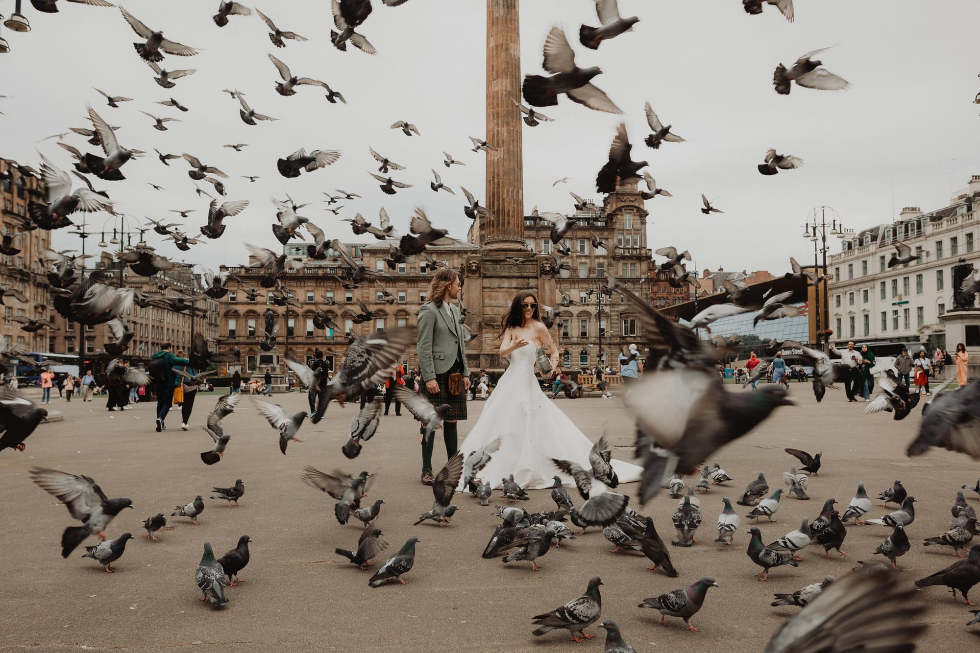 City wedding among the pigeons in George Square, Glasgow