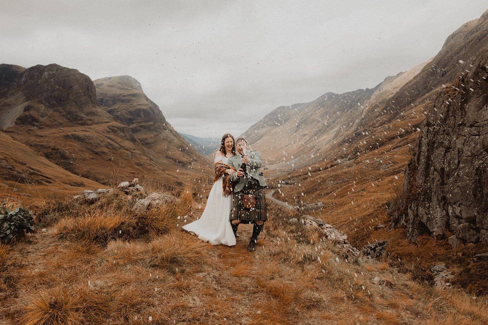 Popping champagne in the middle of Glencoe