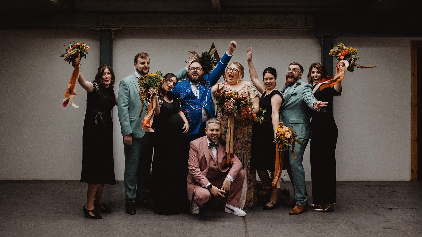 A warehouse wedding party mid-celebration